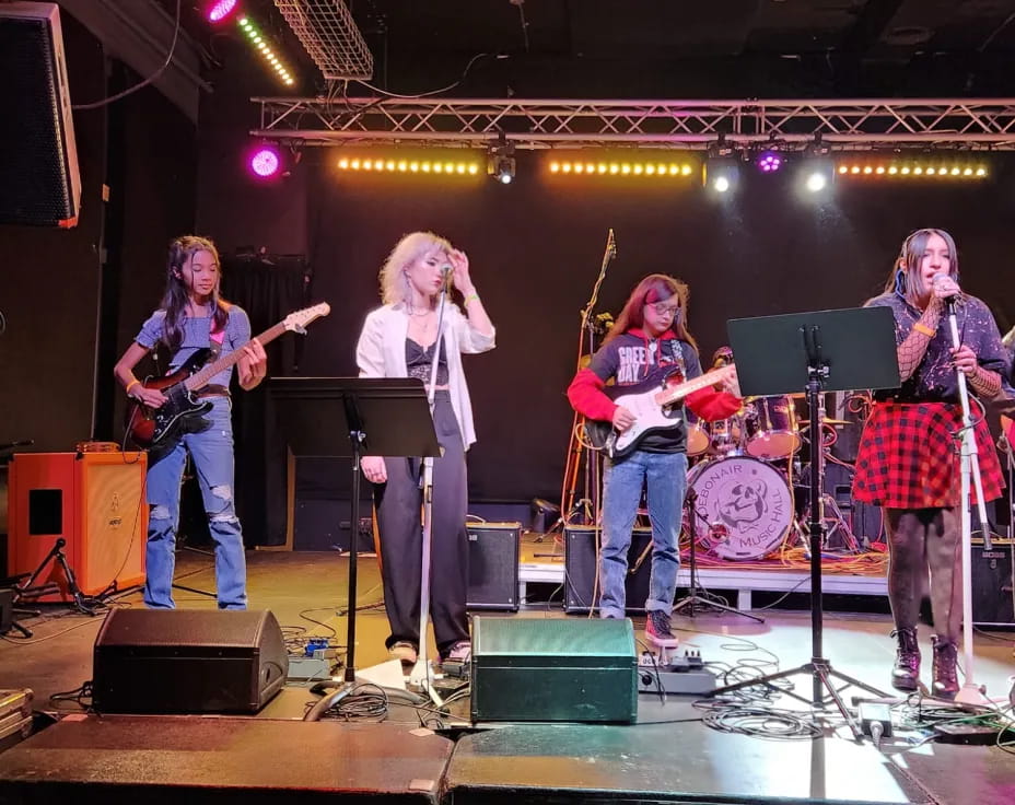 a group of people on a stage