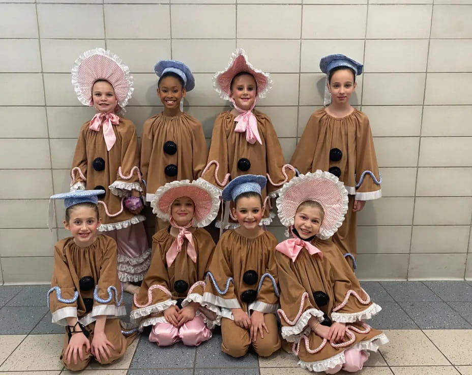 a group of children in clothing