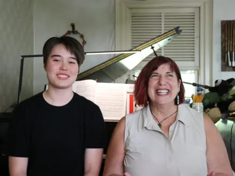 a man and woman smiling