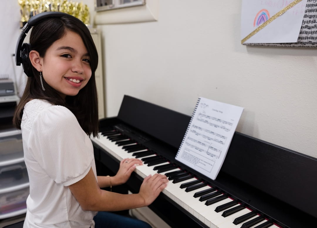 a person playing a piano