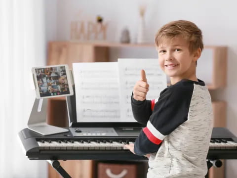 a boy holding a paper