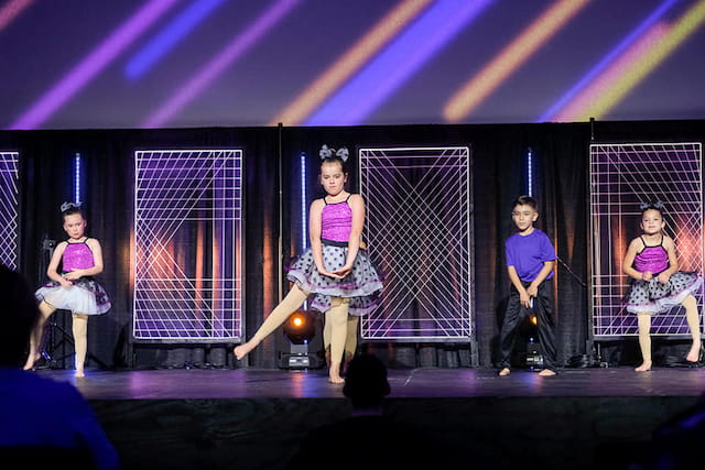 a group of people on a stage