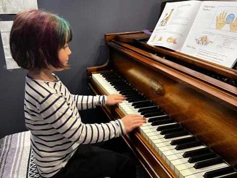 a person playing a piano