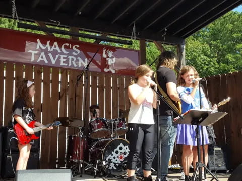 a group of people on a stage