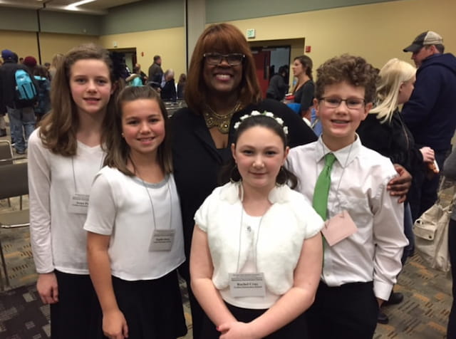 a group of people posing for a photo