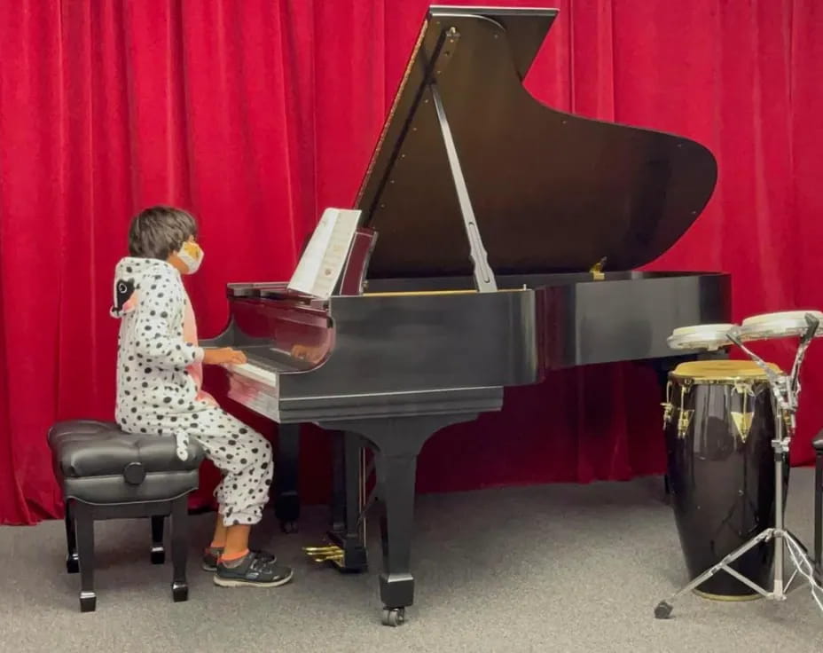 a person playing a piano