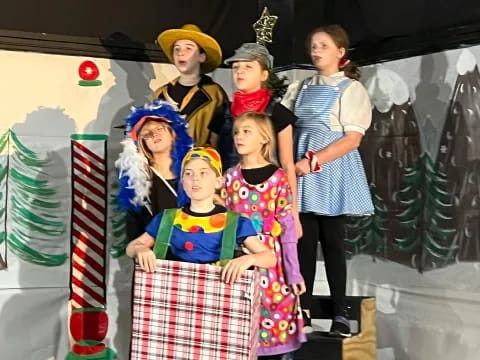 a group of children in clothing