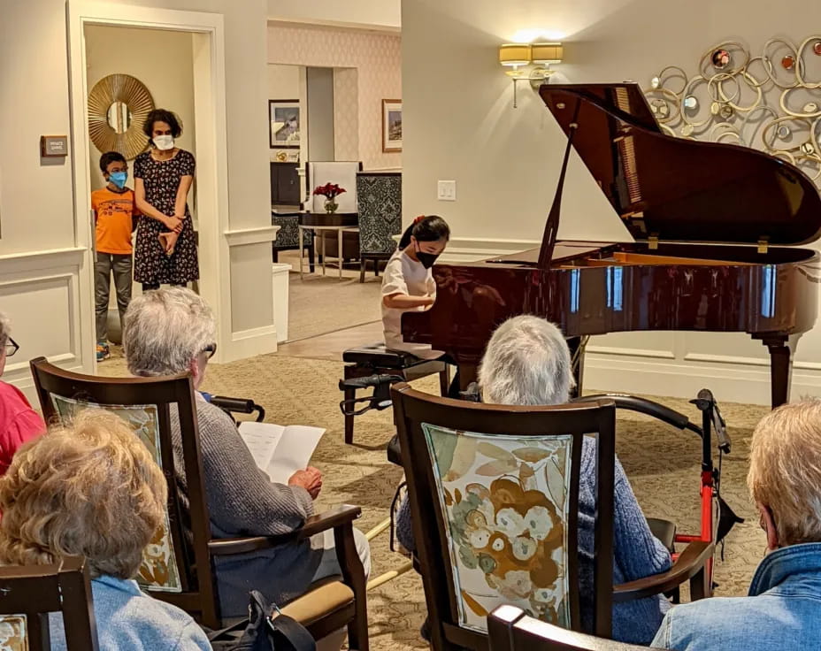a group of people sitting in chairs