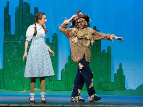 a man and a woman on a stage