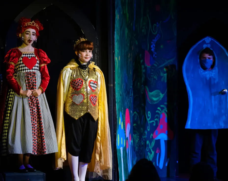 a couple of women on stage