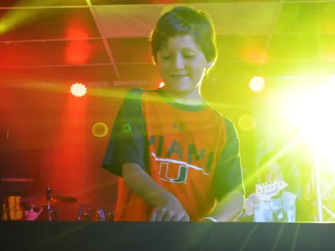 a person playing a guitar