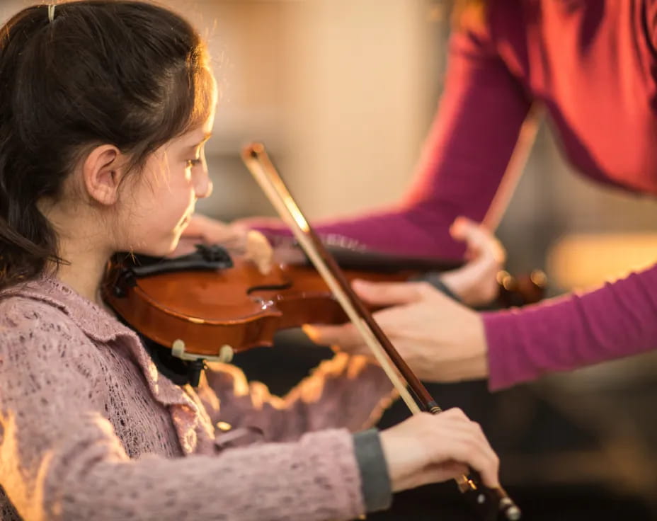 a person playing a violin