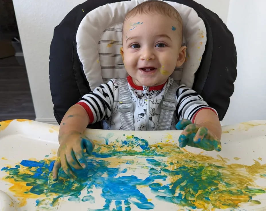 a child sitting at a table