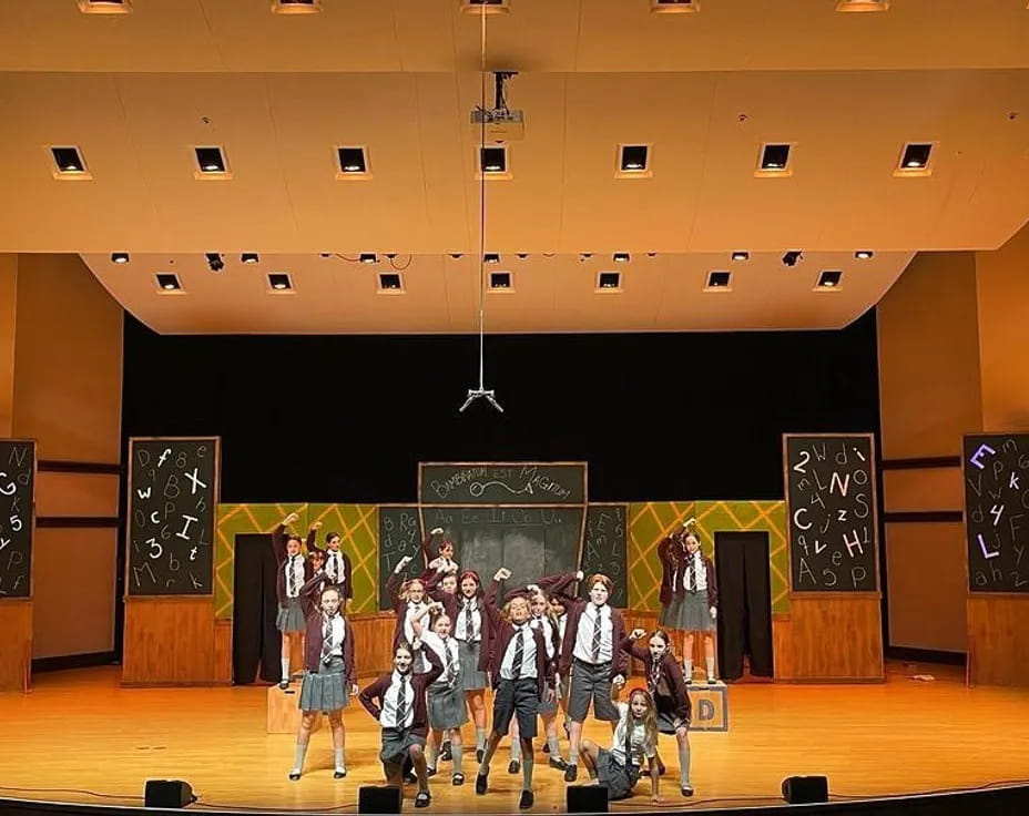 a group of people on a stage