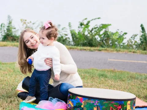 a person holding a child