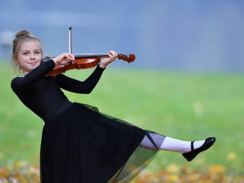 a person playing a violin