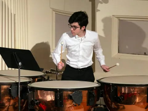 a person playing drums