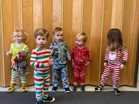 a group of children in pajamas