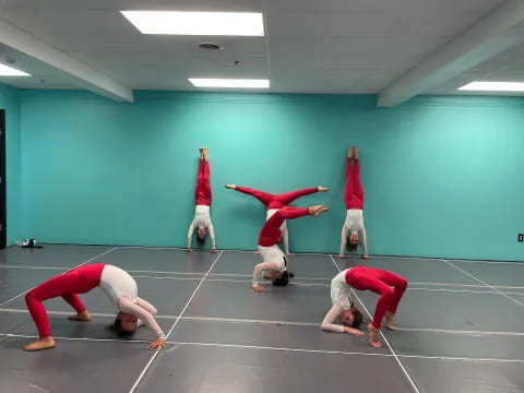 a group of people in a gym