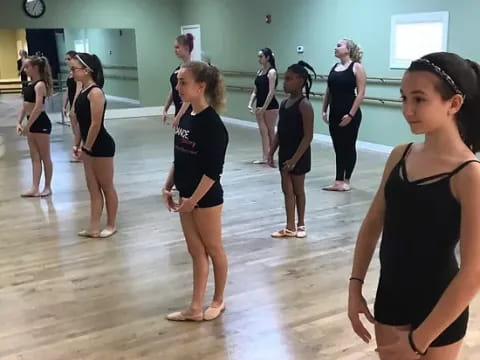 a group of women in a gym