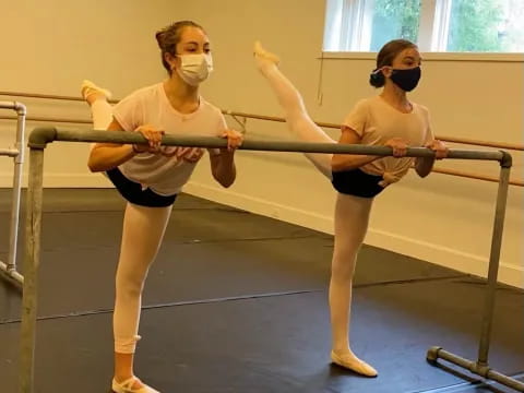 a couple of women in a gym
