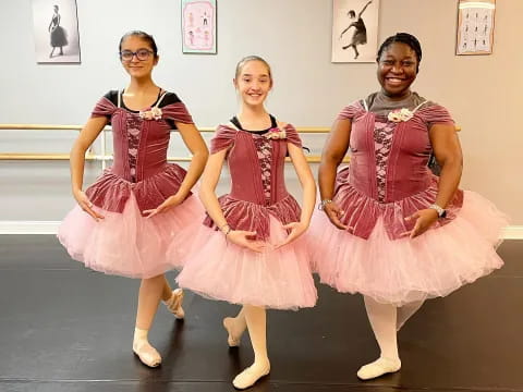 a group of women in dresses