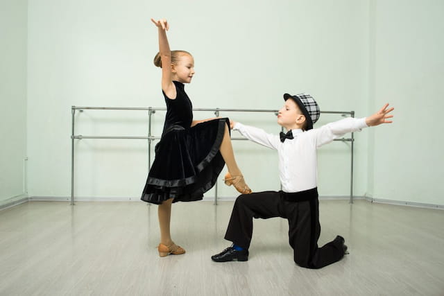 a man and woman dancing