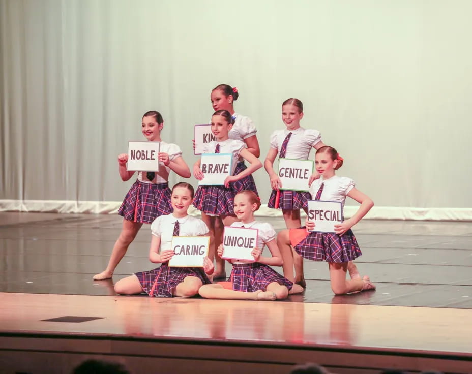 a group of people holding signs