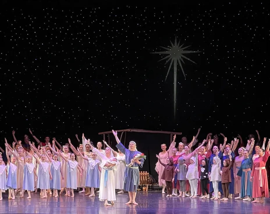 a group of people in a performance