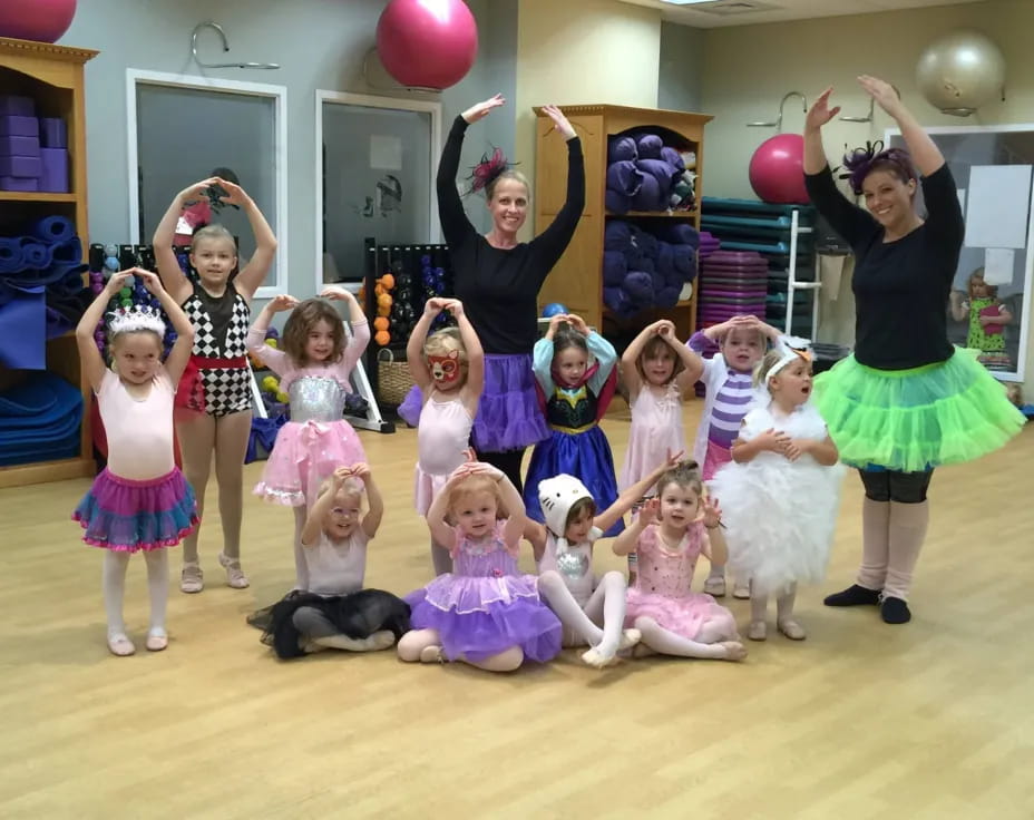 a group of girls posing for a photo