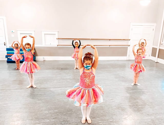 a group of girls dancing