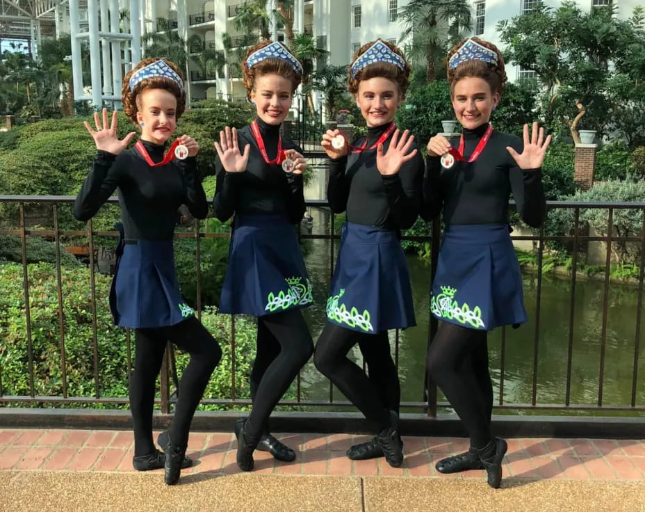 a group of girls in school uniforms