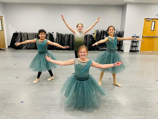 a group of girls dancing