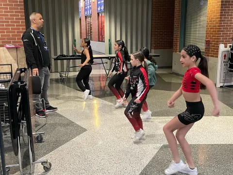 a group of people in a gym