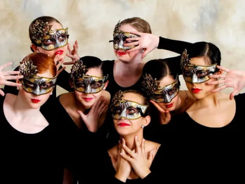 a group of people wearing masks