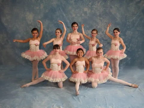 a group of women in dresses