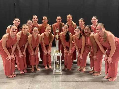 a group of people in red robes