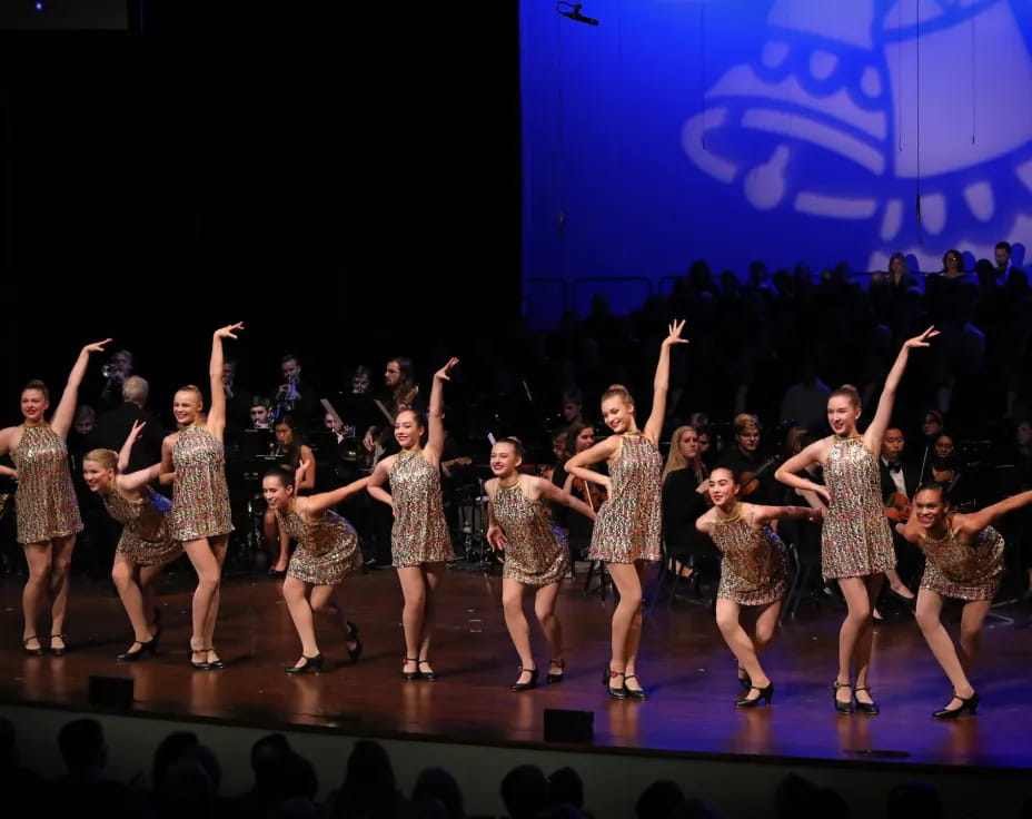 a group of people on a stage