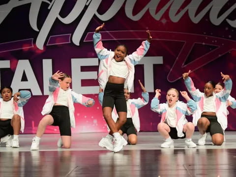 a group of people on a stage