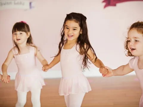 a group of girls dancing