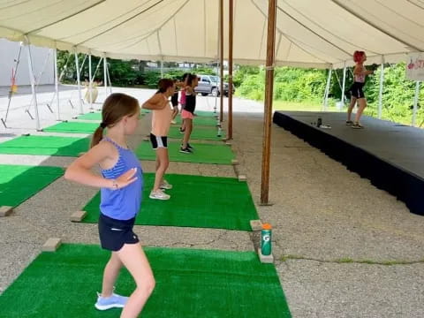 a group of people in a tent