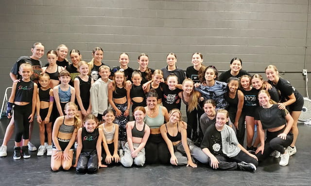 a group of people posing for a photo