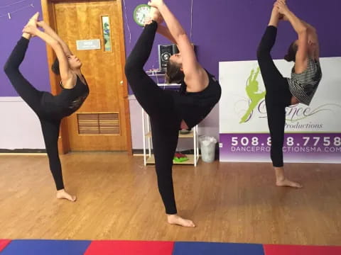 a group of women doing yoga