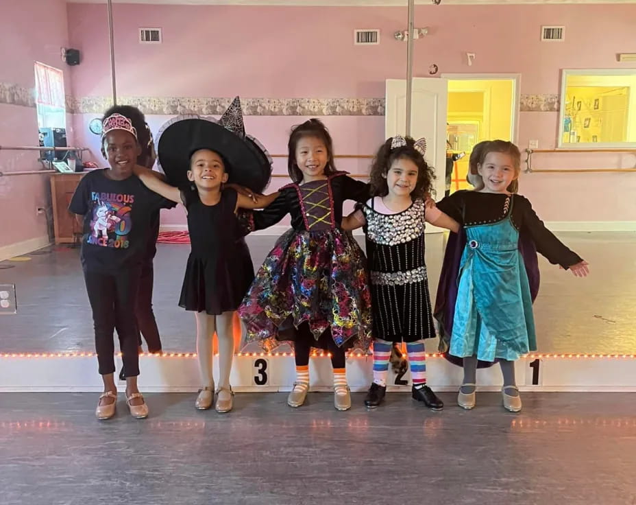 a group of girls in clothing