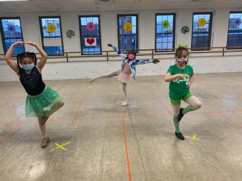 a group of girls playing a sport