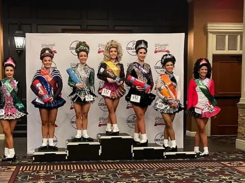 a group of girls wearing clothing