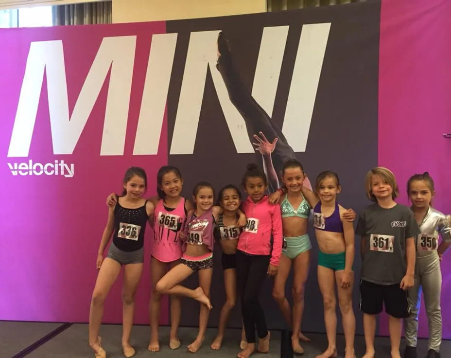 a group of women posing for a photo