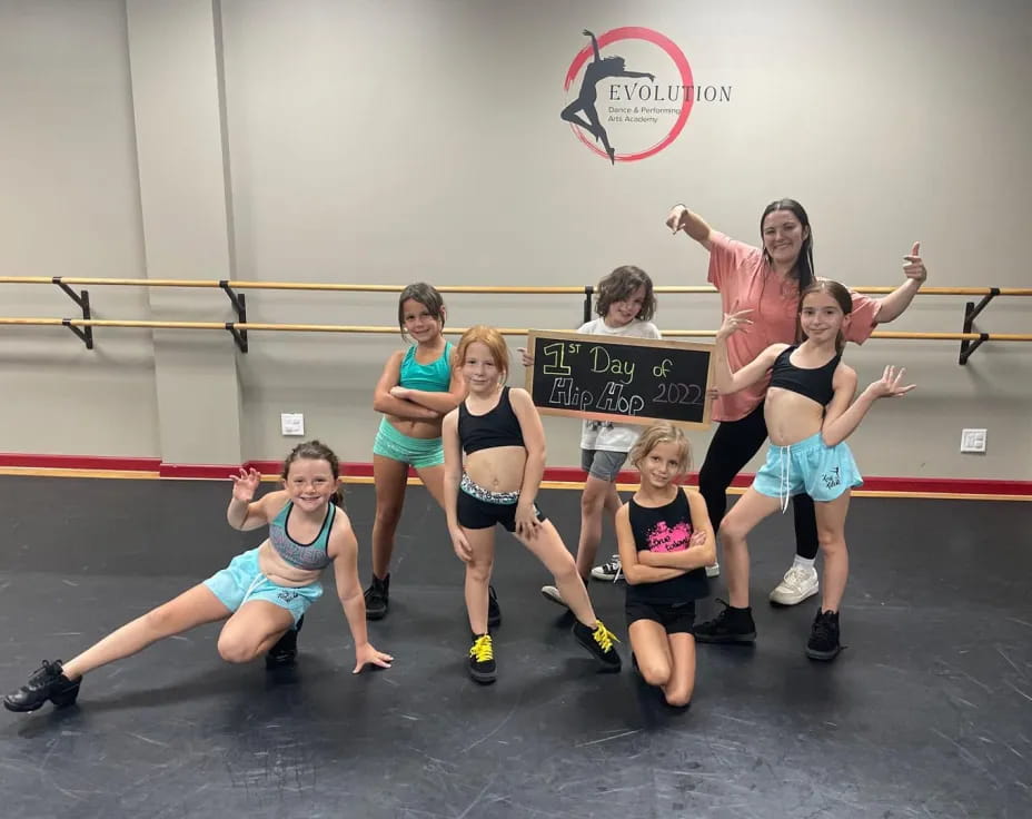 a group of women posing for a photo