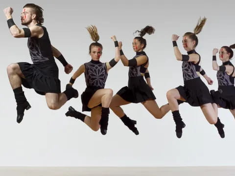 a group of people jumping