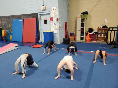 a group of people doing push ups